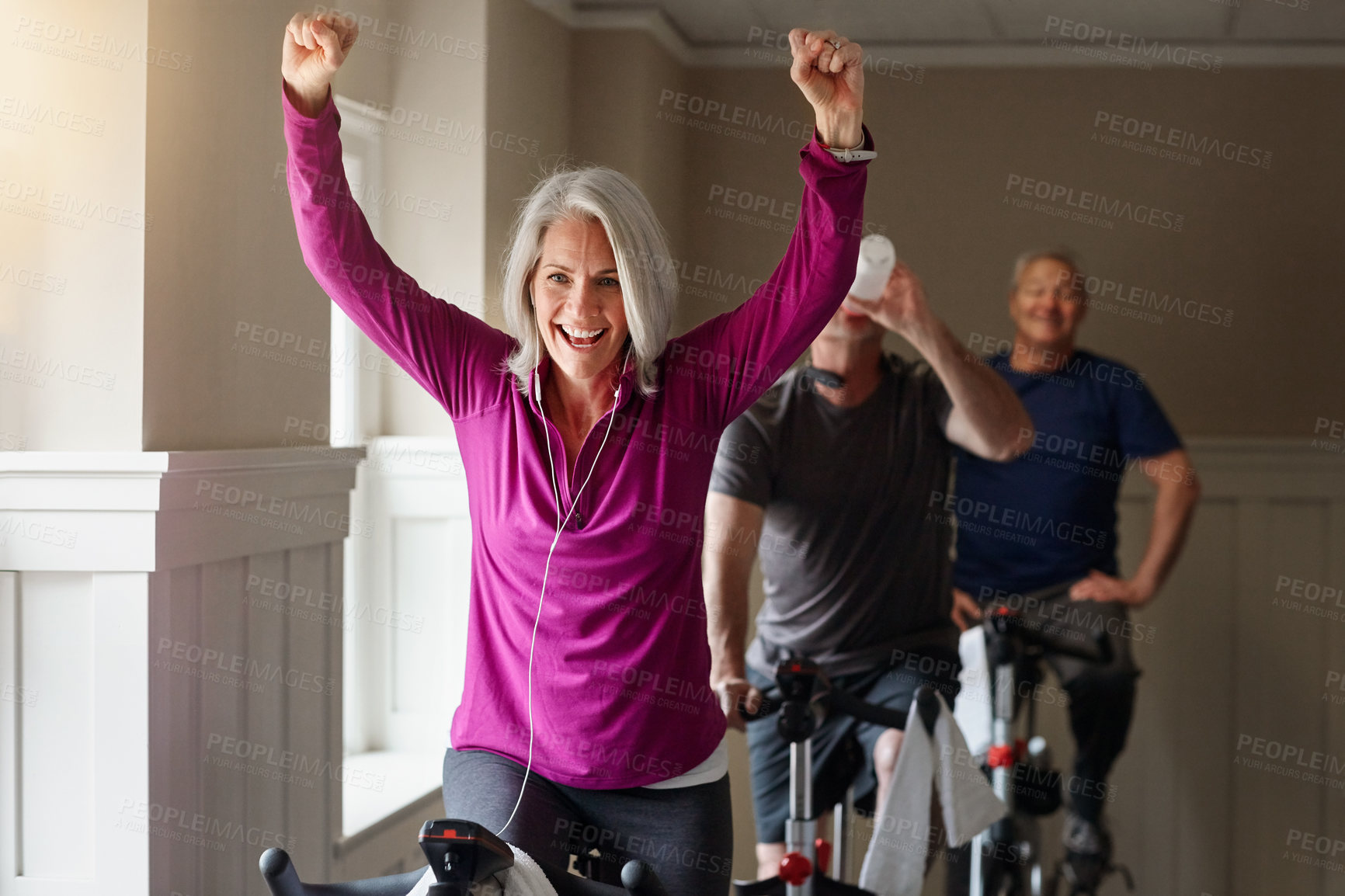 Buy stock photo Class, winning or happy woman on cycling bike in workout or cardio training for progress, health or wellness. Gym, exercise or excited senior person on bicycle machine for fitness, success and goal