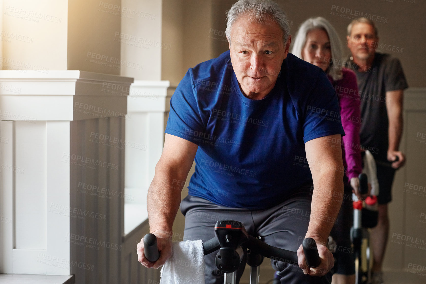 Buy stock photo Fitness, cycling and senior man in gym for spinning class, exercise and training with physical activity. Workout club, people and team on bike machine for health, wellness and endurance with cardio