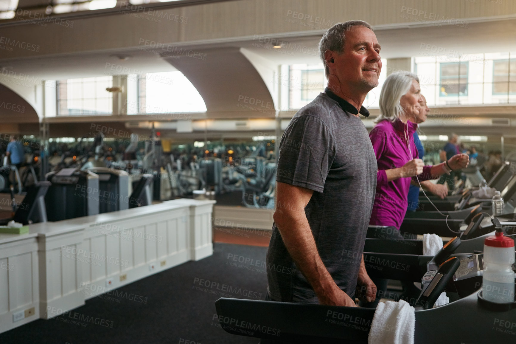 Buy stock photo Thinking, fitness or mature man on treadmill in workout or training for class, health or cardio wellness. Runner, retirement and happy senior person on running machine for gym, energy or exercise