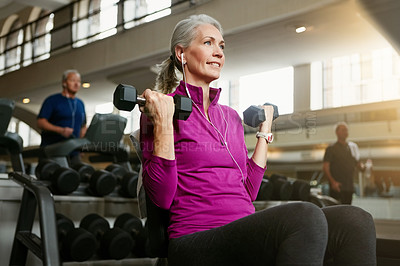 Buy stock photo Dumbbell, fitness and music with woman on bench in gym for physical training or workout. Exercise, health and wellness with happy or mature athlete person in performance club for active challenge