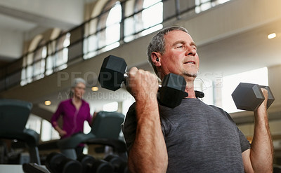 Buy stock photo Senior fitness, gym and old man with dumbbells for weightlifting, challenge or  workout, training or bodybuilding. Biceps, arms and elderly person with hand weight for strength, mindset or exercise