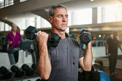 Buy stock photo Senior fitness, old man and dumbbells at a gym for weightlifting, challenge or workout, training or bodybuilding. Biceps, arms and elderly person with hand weight for strength, mindset or exercise