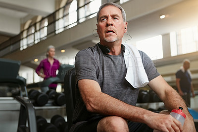 Buy stock photo Fitness, break and tired senior man at a gym with water after training, exercise or challenge. Sports, fatigue and elderly male person with liquid for hydration, recovery or resting from workout