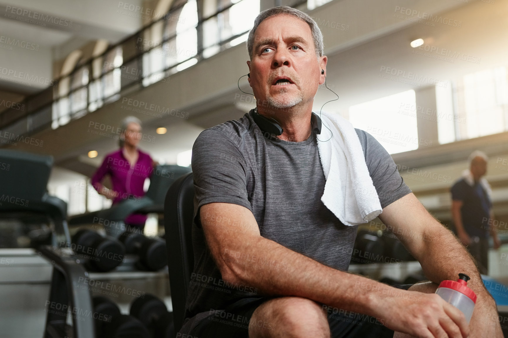 Buy stock photo Fitness, break and tired senior man at a gym with water after training, exercise or challenge. Sports, fatigue and elderly male person with liquid for hydration, recovery or resting from workout