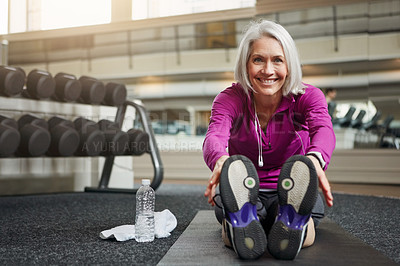 Buy stock photo Mature woman, warm up and legs on floor, stretching and smile in portrait for workout in gym. Person, muscle and start training for wellness with development, ready and exercise mat at fitness club