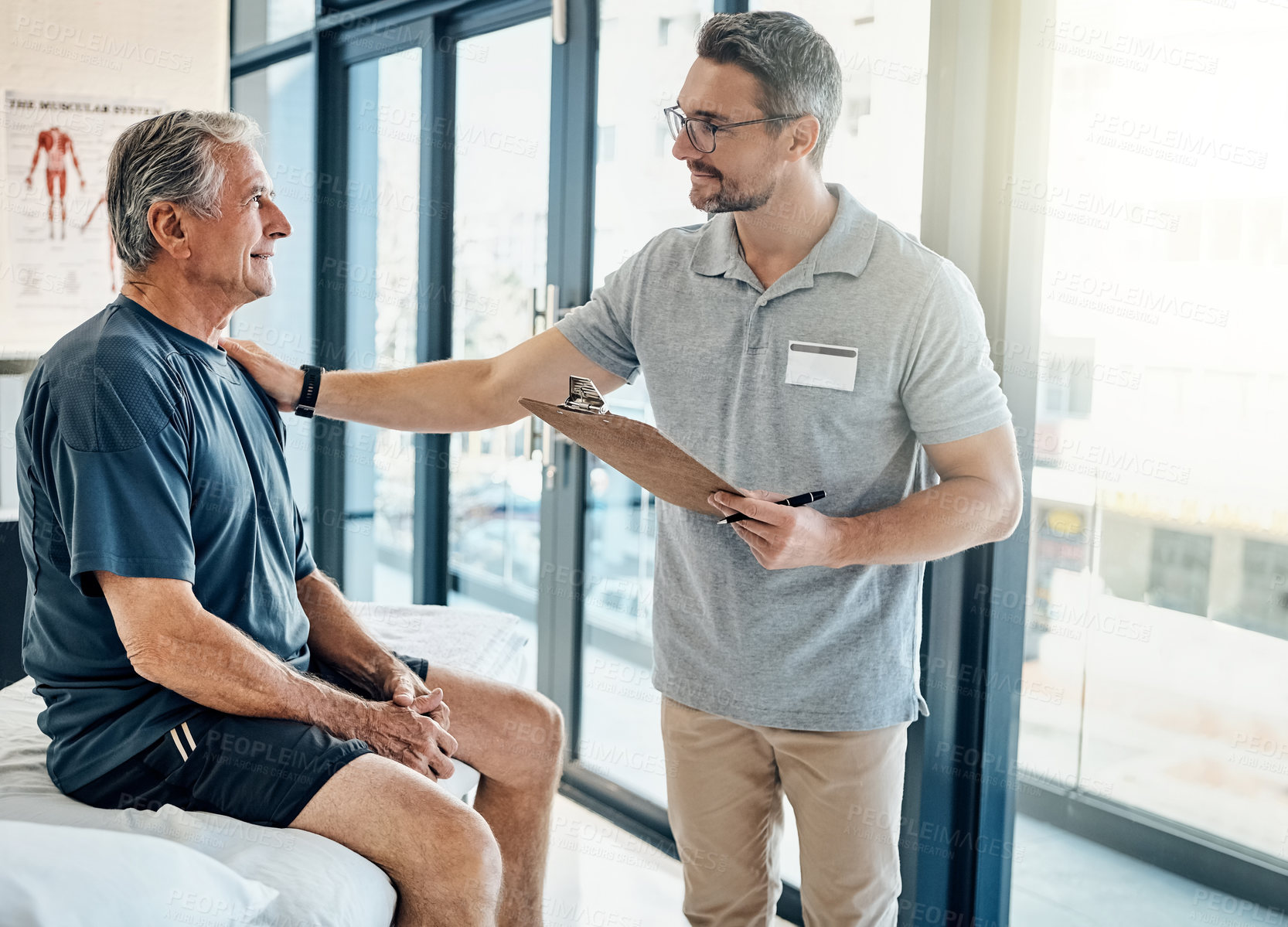 Buy stock photo Physical therapy, chiropractor and senior man consulting with clipboard for rehabilitation, recovery and treatment. Healthcare, physiotherapy and patient for medical service, wellness and support