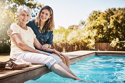 Buy stock photo Women in portrait, relax together and swimming pool, love and care with quality time during summer vacation. Elderly mother, daughter and vacation, outdoor pool and wellness lifestyle with family