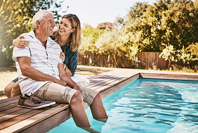 Buy stock photo Senior couple, swimming pool and relax happiness on travel holiday or summer vacation outdoor. Elderly man, woman smile and conversation, happy bonding and calm peace for support or relaxing together