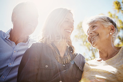 Buy stock photo Woman, elderly parents and garden for sunshine lens flare, bonding or relax together in summer. Happy family, mother and daughter with senior man for love, care or outdoor at park, nature or backyard