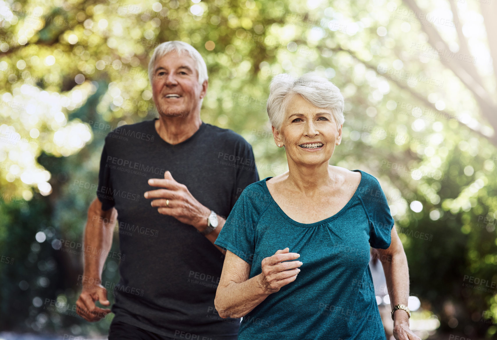 Buy stock photo Running, outdoor and old couple with fitness, portrait and bonding together with wellness, sunshine and hobby. People in park, senior man and mature woman with training, retirement and challenge 