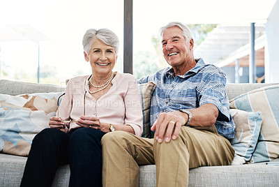 Buy stock photo Portrait of a happy senior couple relaxing on the sofa together at home