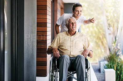 Buy stock photo Shot of a nurse caring for a senior patient in a wheelchair outside a retirement home