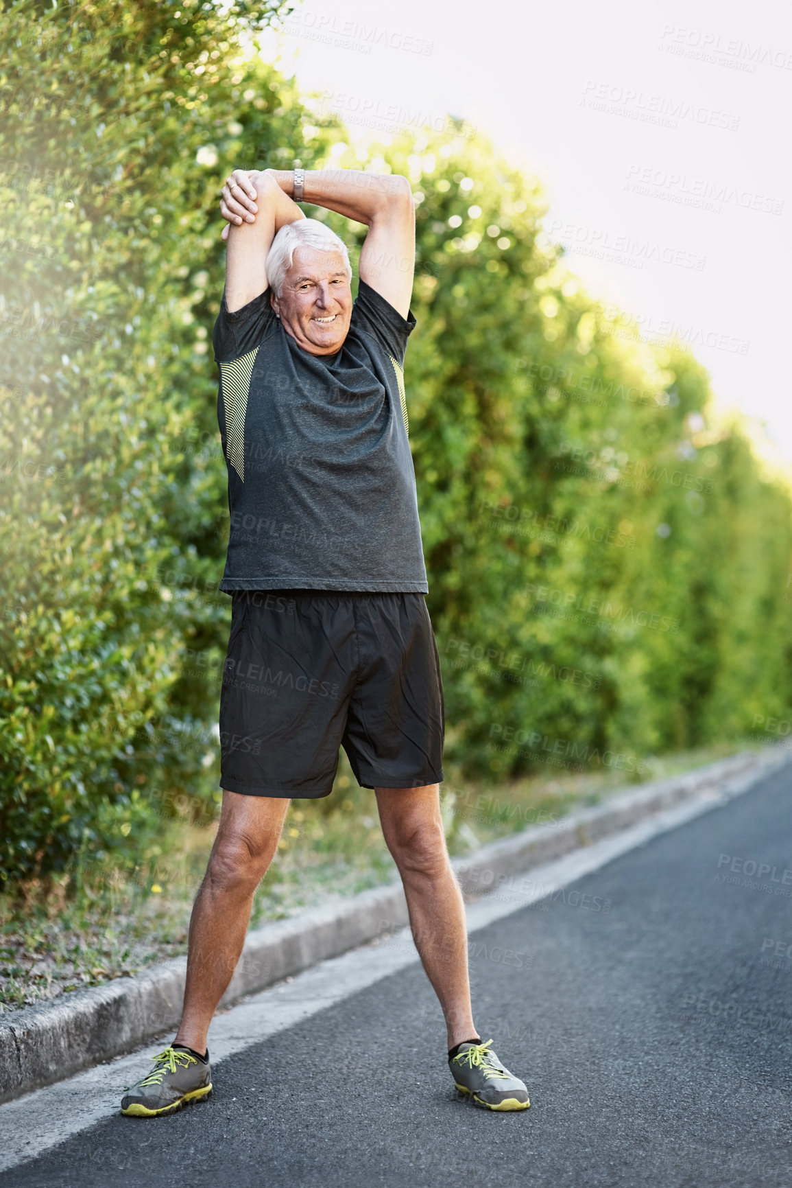 Buy stock photo Portrait, old man and stretching arms for fitness ready for workout, exercise or training in nature. Senior person, warm up and prepare for physical activity, running or cardio with smile outdoor