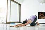 Improving her flexibility through yoga