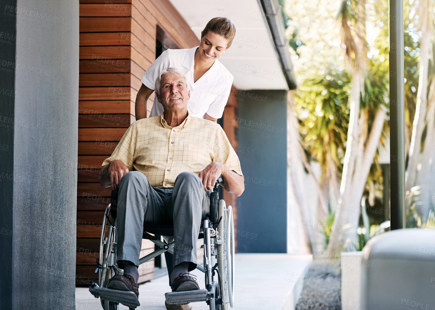 Buy stock photo Elderly, man and caregiver outside with wheelchair, wellness and person with disability for healthcare service. Retirement, nursing home and support or professional nurse, happy and people together