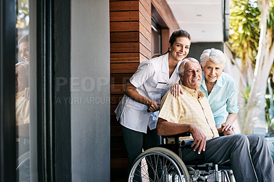 Buy stock photo Portrait of a senior couple and a nurse outside a retirement home
