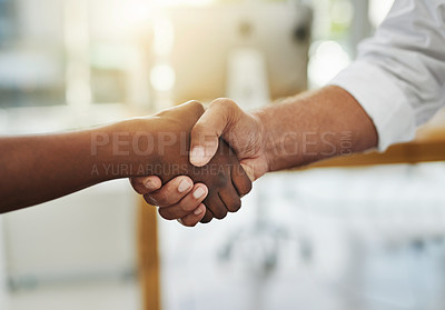 Buy stock photo A team handshake in agreement between colleagues and coworkers in an office. Working together as a team to achieve success, merge as a partnership or promote a business person at work closeup