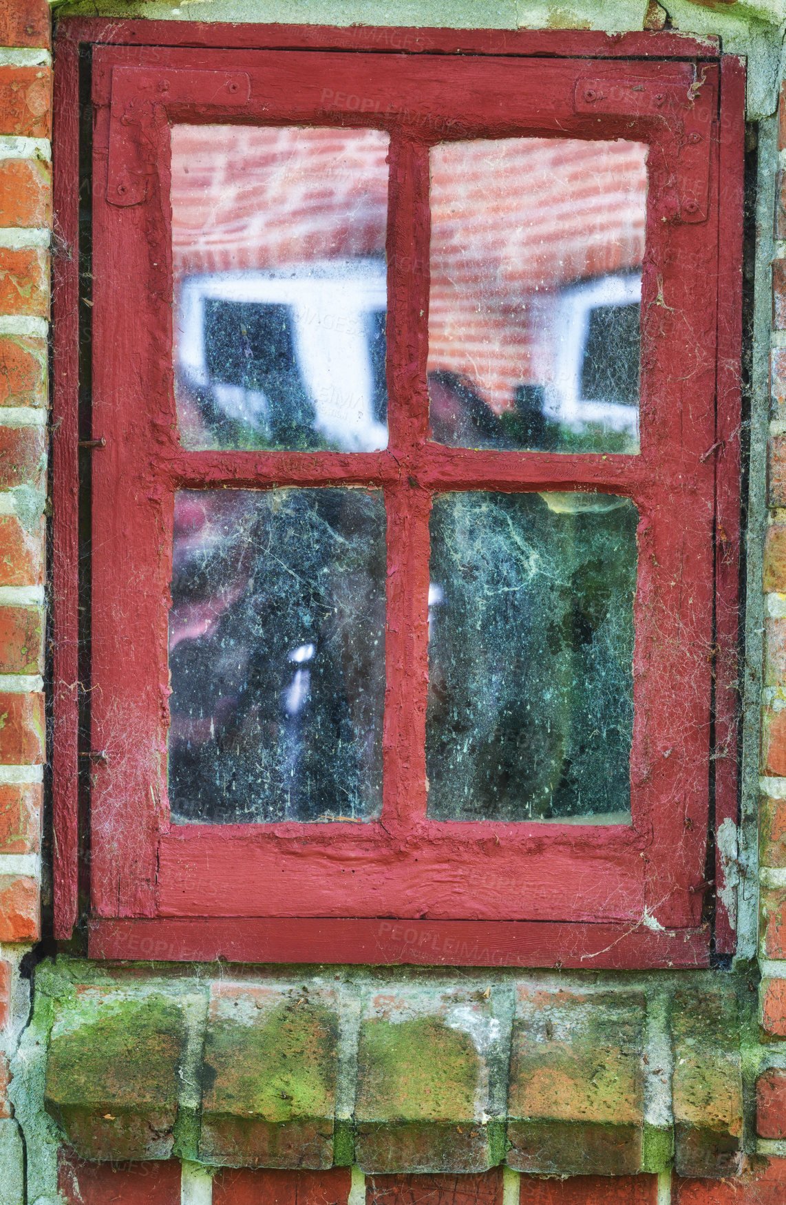 Buy stock photo Dirt, window and frame with green moss of abandoned house, damaged property or old apartment. Empty, glass and architecture with fungal growth for weathered exterior, low maintenance or bad condition