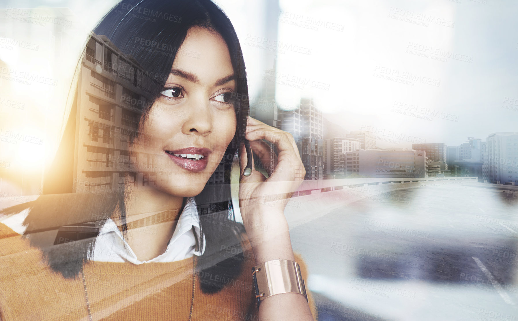 Buy stock photo Multiple exposure shot of a call centre agent superimposed over a cityscape