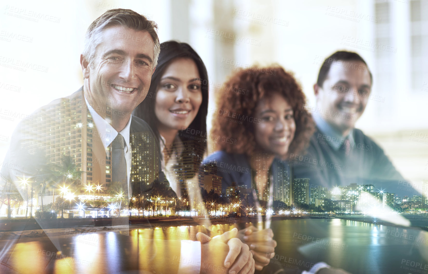 Buy stock photo Multiple exposure shot of businesspeople superimposed over a cityscape