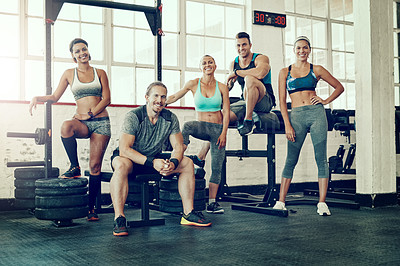 Buy stock photo Portrait of a group of young people at the gym