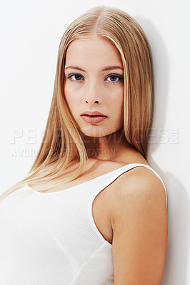 Buy stock photo Woman, portrait and fashion in beauty cosmetics, makeup or for style on a white studio background. Face of casual female person or young attractive model with long hair on wall for facial treatment