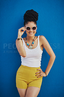 Buy stock photo Fashion, portrait and woman with sunglasses on blue background, wall and summer streetwear, trendy clothes or shades mockup. Girl, happy and excited model with cool style, vision and urban mock up