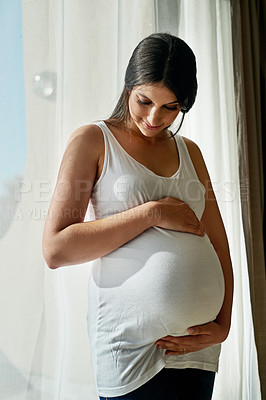 Buy stock photo Pregnancy, parent and woman by window in home hold stomach for love, prenatal care and support in morning. Family, pregnant and person hug tummy for wellness, baby health and maternity in living room