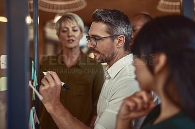 Buy stock photo Businessman, team and writing in planning schedule for brainstorming, collaboration or strategy meeting at office. Man employee in leadership, presentation or training staff in teamwork for project