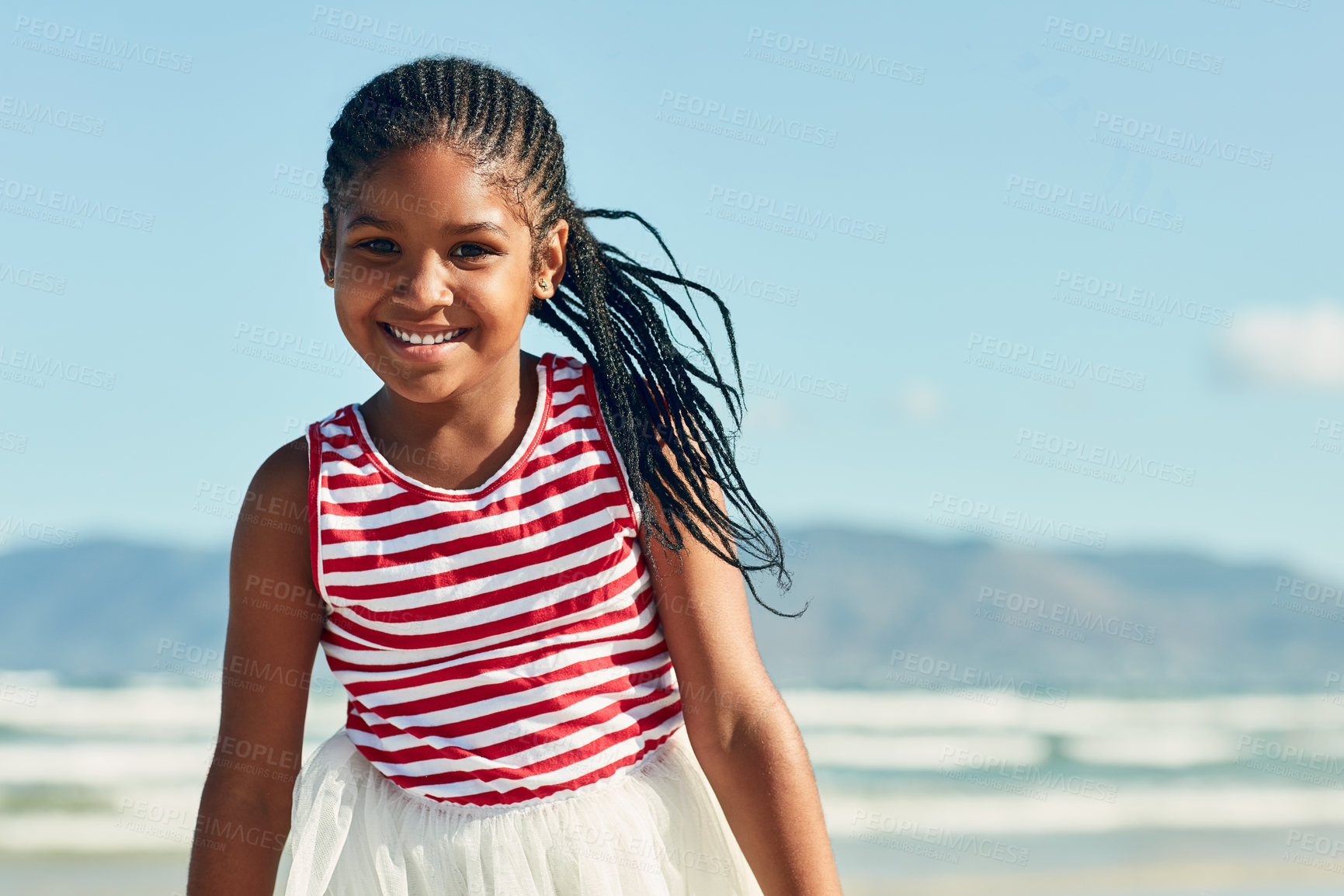 Buy stock photo Portrait of an adorable little girl having fun at the beach