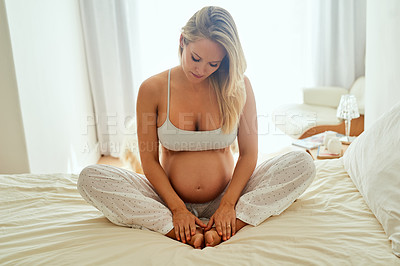 Buy stock photo Shot of a pregnant woman at home