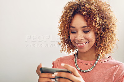 Buy stock photo Phone games, smile or happy woman on break playing online gaming, subscription or connection. Designer ,video gamer or African person with mobile app in workplace for streaming multimedia to relax