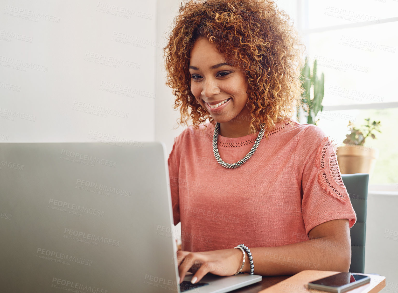 Buy stock photo Office, typing or happy woman with laptop for research, technology or online business on website. African person, smile or female worker in workplace working on update, networking or reading news