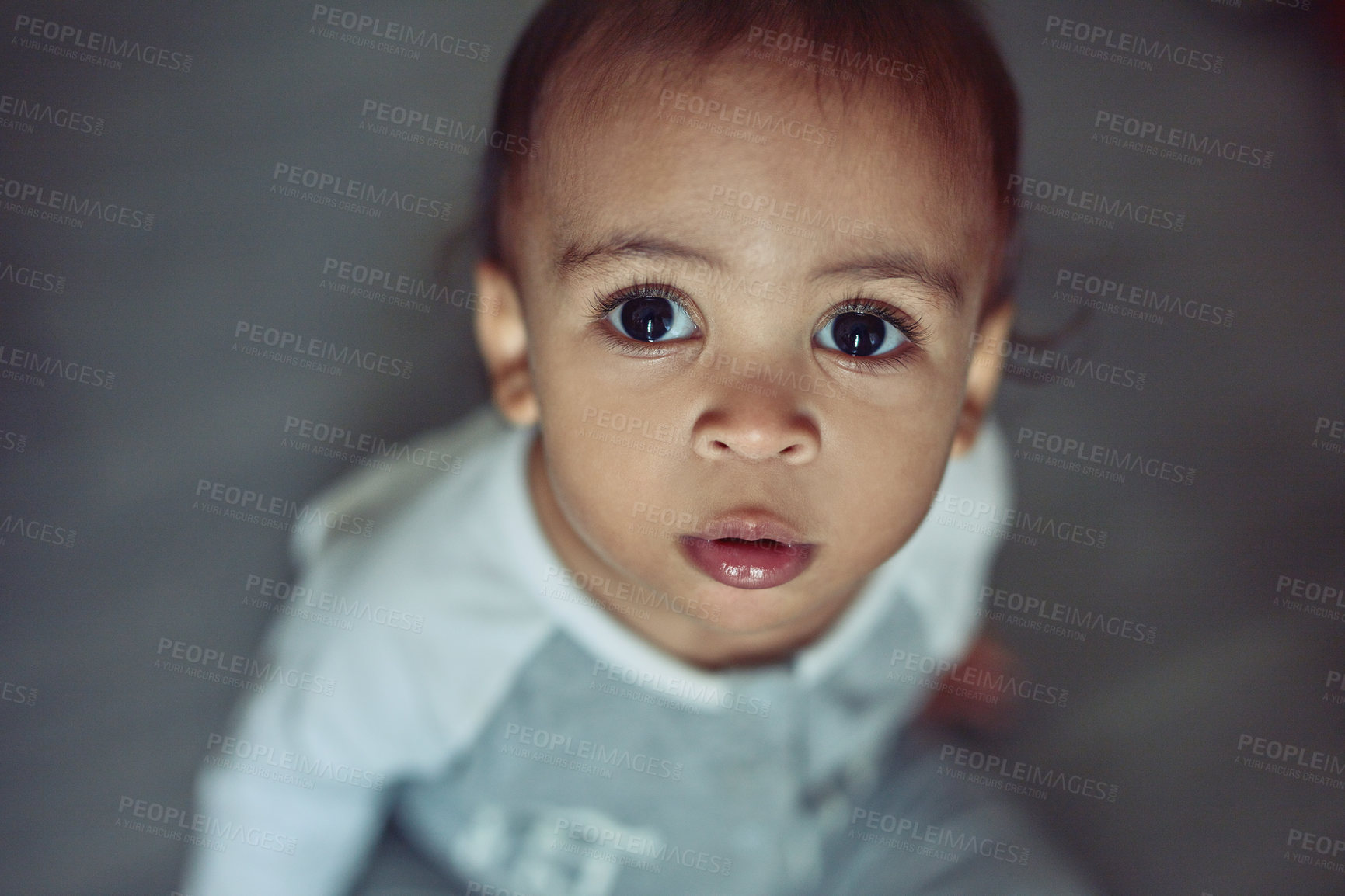 Buy stock photo Cute, growth and portrait of boy baby in home for playing, learning or cognitive motor skills for development. Sweet, adorable and high angle of infant in nursery room for early childhood in house.