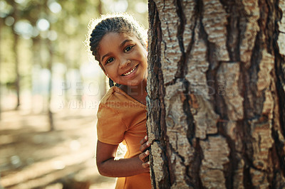 Buy stock photo Portrait of a little girl playing in the woods