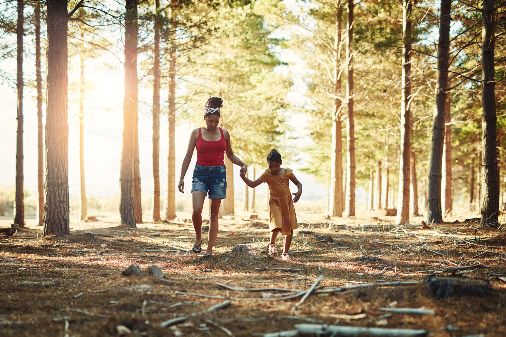 Buy stock photo Mom, girl and outdoor on walk, holding hands for adventure in forest with bonding for love and care. Hiking, mother and daughter with freedom, talk and explore together in park, woods or nature