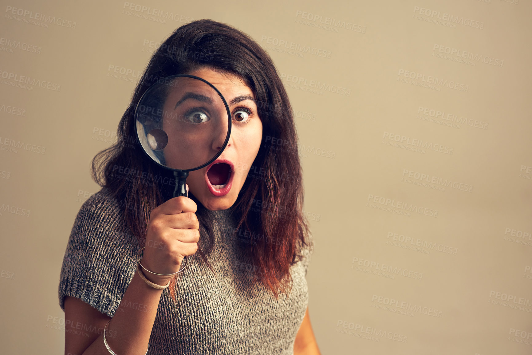 Buy stock photo Girl, portrait and surprise with magnifying glass in studio for investigation on bargain for price saving and retail discount.  Spy, loupe and inspection with shock on background for fashion deal.