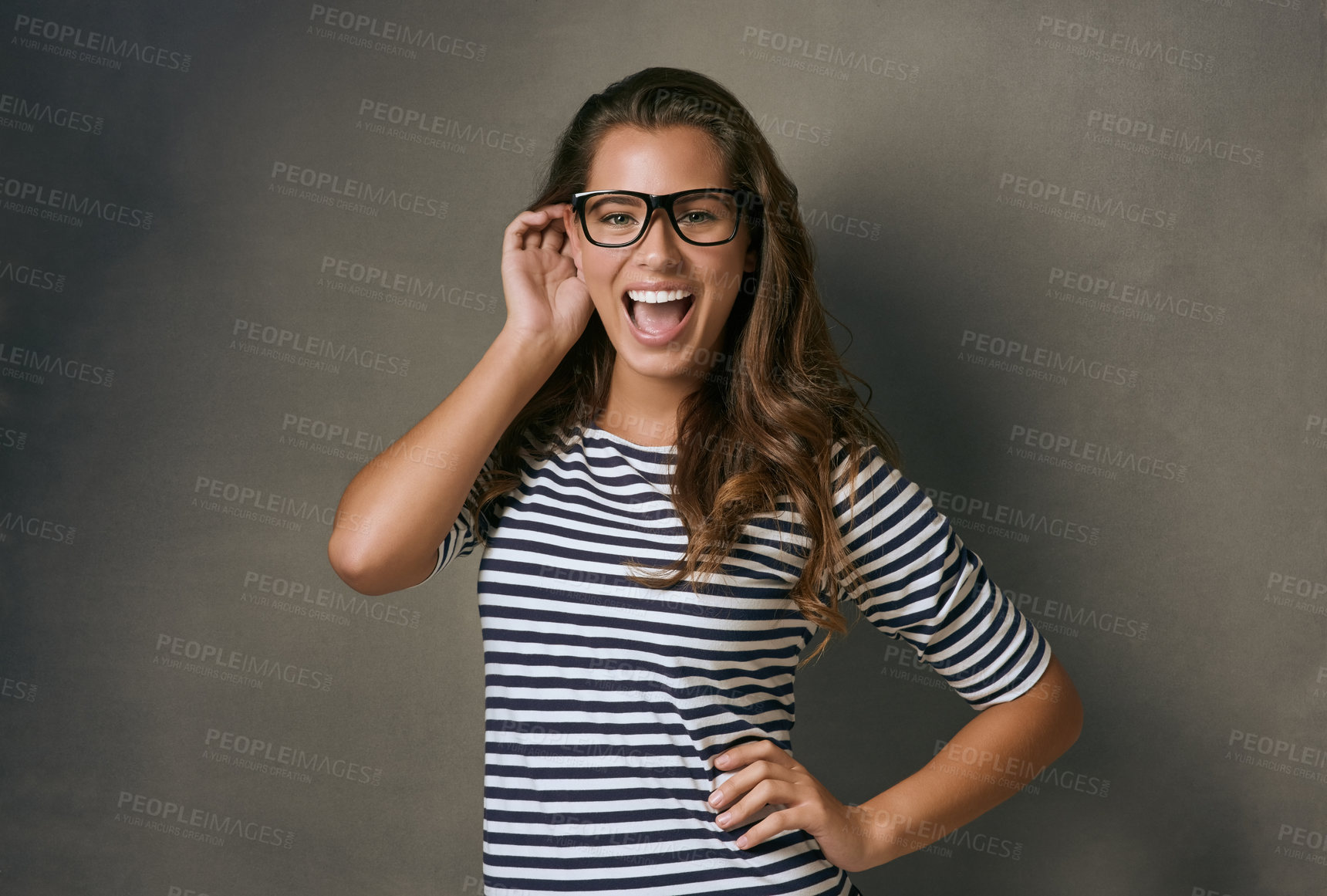 Buy stock photo Woman, portrait and laugh with glasses in studio with prescription lens for eye care, optometry and healthcare. IT professional, confident and gray background with spectacles for vision and space.