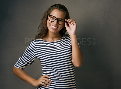 Buy stock photo Woman, portrait and confidence with glasses in studio with prescription lens for eye care, optometry and healthcare. IT professional, happy and gray background with spectacles for vision and eyesight