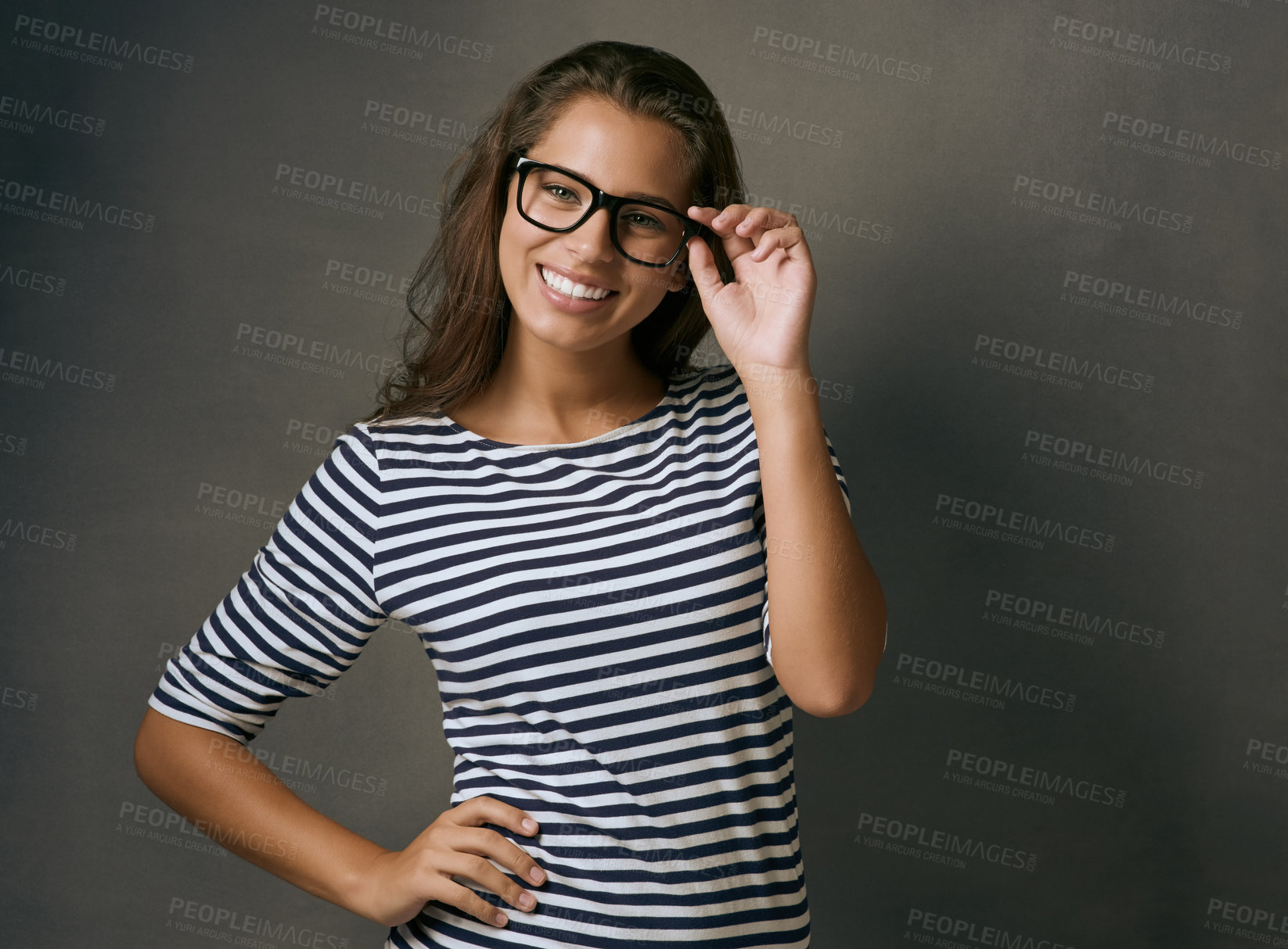 Buy stock photo Woman, portrait and confidence with glasses in studio with prescription lens for eye care, optometry and healthcare. IT professional, happy and gray background with spectacles for vision and eyesight