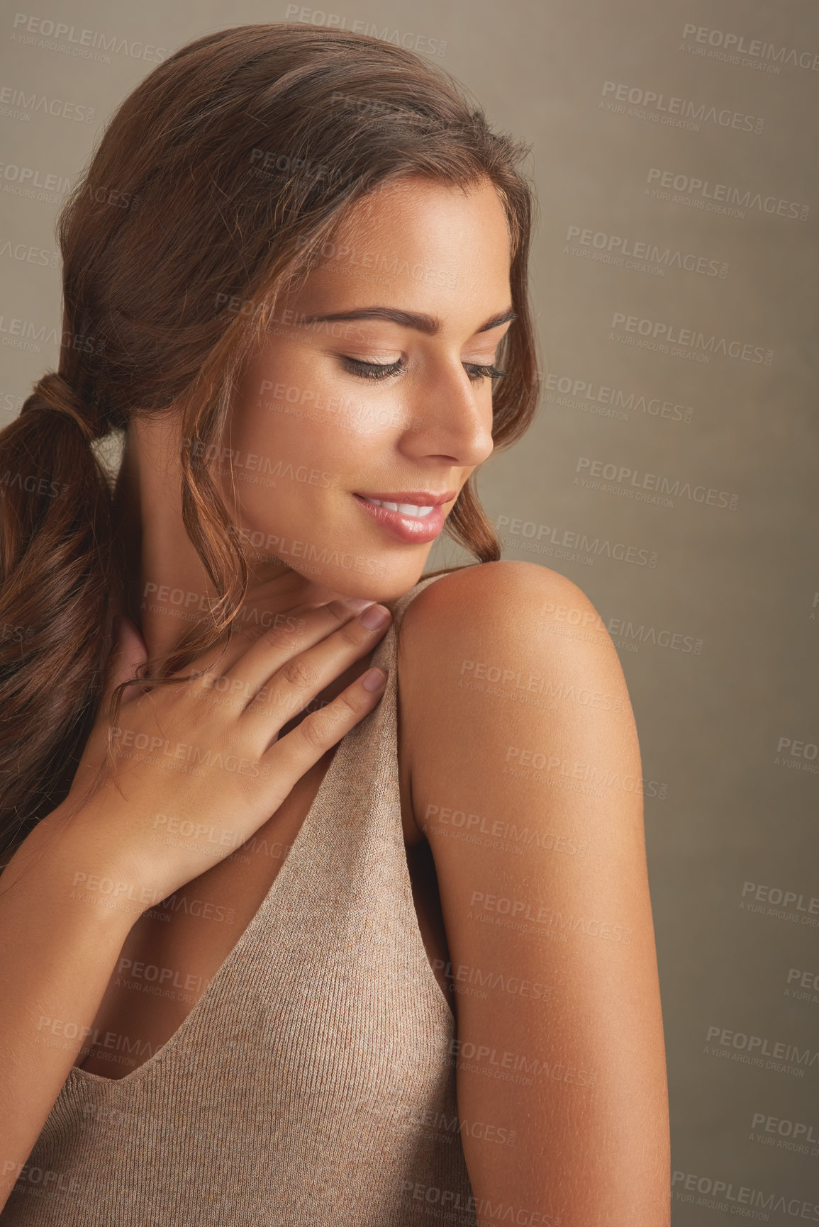 Buy stock photo Beauty, smile and face of woman in studio for wellness, health and skincare treatment. Salon aesthetic, dermatology and isolated happy person with glow, cosmetics and makeup on brown background