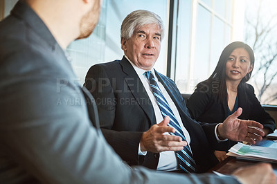 Buy stock photo Business meeting, people and discussion with manager in office for budget report, review or feedback. Company, financial advisor and consulting with documents for investment, partnership and proposal