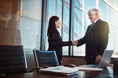 Buy stock photo Business man, woman and shaking hands in boardroom with agreement, thanks or success at financial agency. People, risk analyst and leader with handshake, respect or b2b collaboration in modern office