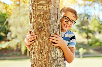 Buy stock photo Portrait of a little boy playing at the park