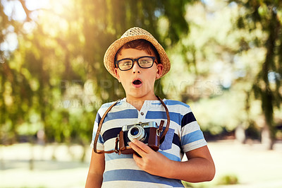 Buy stock photo Boy, surprise and portrait with camera in park for photography of nature, memory and outdoor fun. Male child, garden and shock with wow for reaction, unexpected 
 picture and expression for moment.