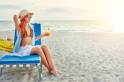 Buy stock photo Beach, chair and happy woman with fruit cocktail on holiday, travel and summer vacation outdoor on island in Greece. Sea, laugh and girl in bikini with alcohol drink while thinking at ocean to relax