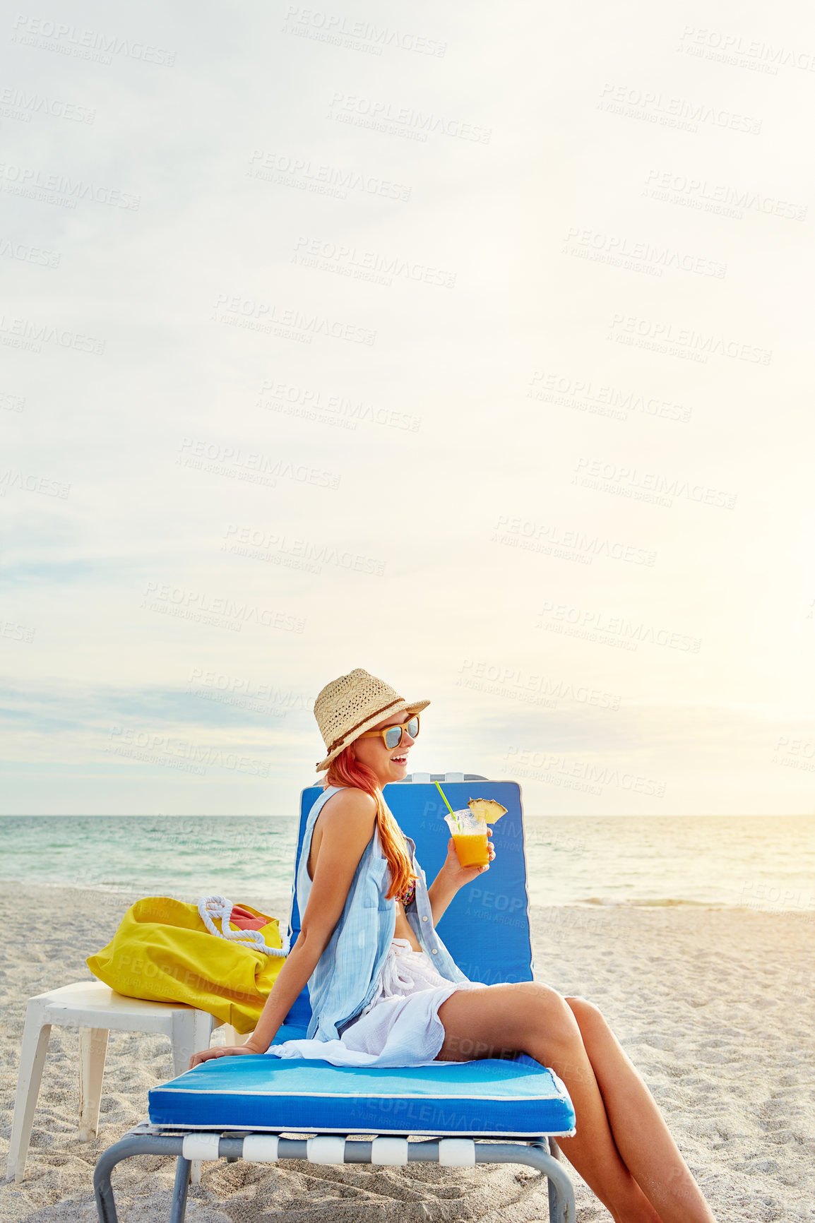 Buy stock photo Beach, relax and happy woman with cocktail on holiday, travel and summer vacation outdoor on island in Maldives. Sea, laughing and tourist girl with alcohol fruit drink at ocean mockup space on chair