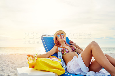 Buy stock photo Beach, relax and happy woman with fruit cocktail on holiday, travel or summer vacation outdoor on mockup in Ireland. Sea, laughing and funny girl with alcohol drink while sunbathing at ocean on chair