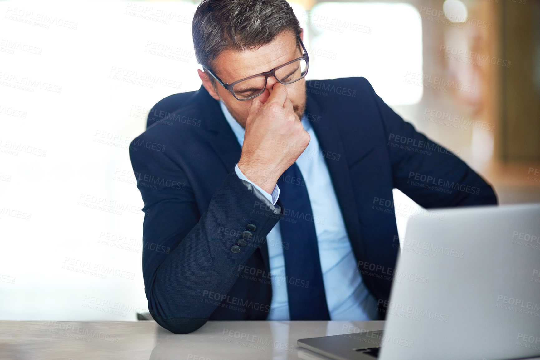 Buy stock photo Employee, stress and man with a headache, laptop and anxiety with error, burnout or overworked. Male person, consultant or tired agent with a pc, migraine or internet issue with depression or fatigue