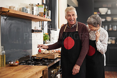 Buy stock photo Cooking, portrait and senior couple in kitchen at home with ingredient for health diet meal. Laughing, food and elderly man and woman with funny joke for dinner, lunch or supper with vegetables.